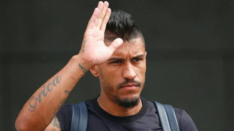 He's back: Paulinho goes from Barca to World Cup to Guangzhou