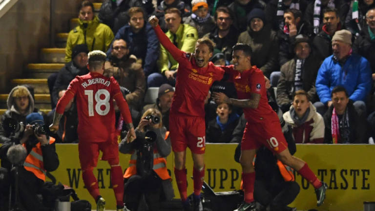 Lucas sees Liverpool through in FA Cup replay