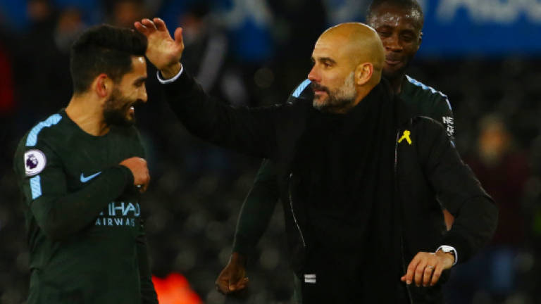 Record-breaker Guardiola relishes Spurs test