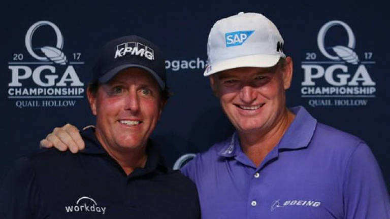 Els, Mickelson credit Tiger with helping them reach 100 majors