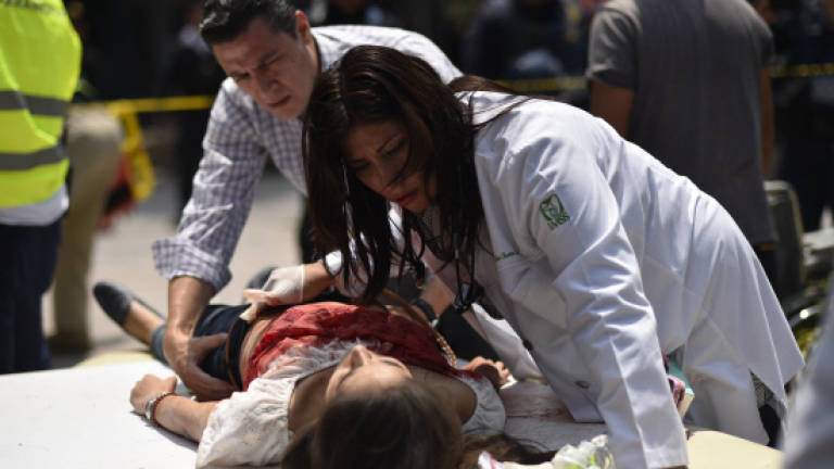 In Mexico's earthquake, tragedies and miracles