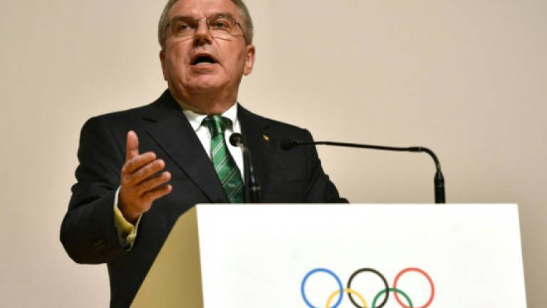 IOC chief urges total review of world anti-doping system