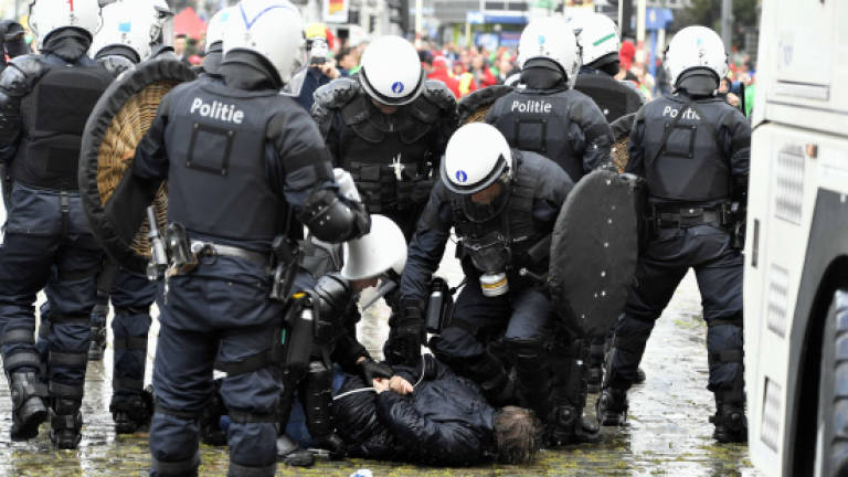 Brussels police fire water-cannon at anti-austerity protest