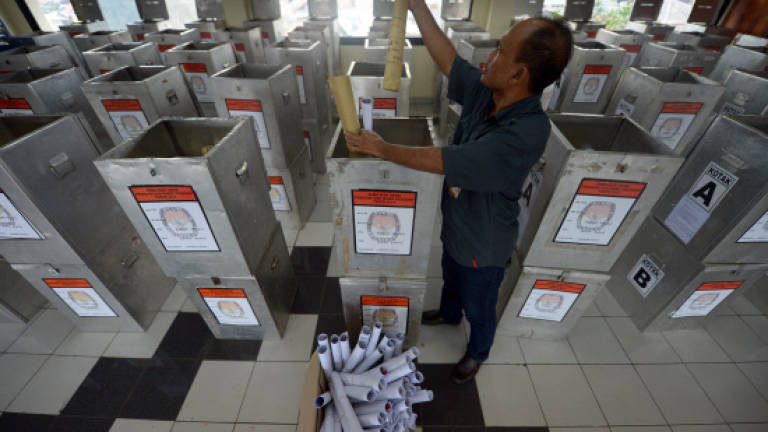 In Indonesia vote, ballots travel on horseback and by boat