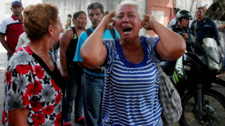 Anger mounts over Venezuela jail fire that killed 68