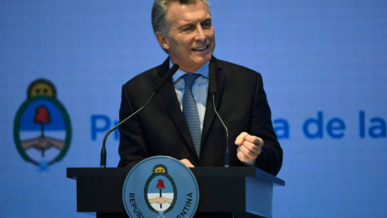 Macri calls on business, unions to back reform plans