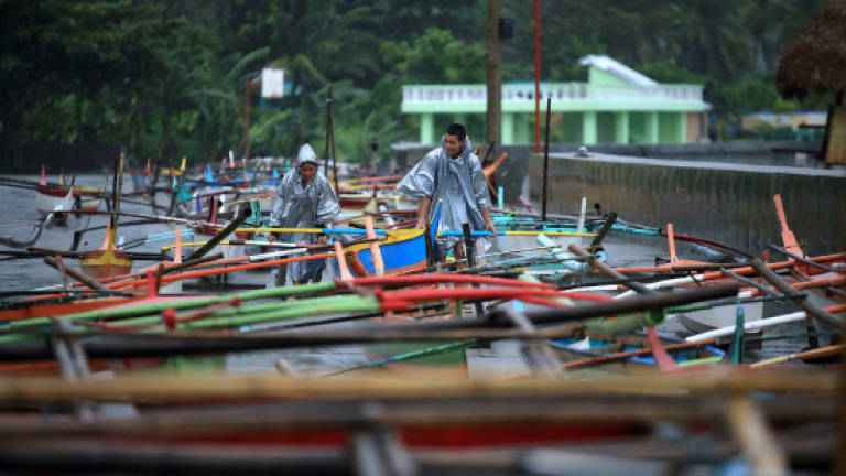 Christmas typhoon leaves four dead in Philippines