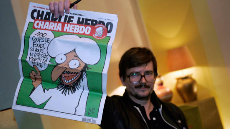 France's Charlie Hebdo publishes provocative Islam cartoon