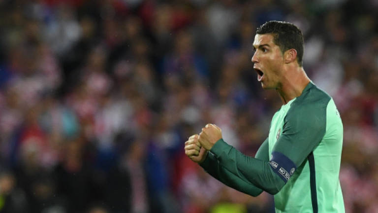 Ronaldo and Portugal grab quarters place at Euro 2016