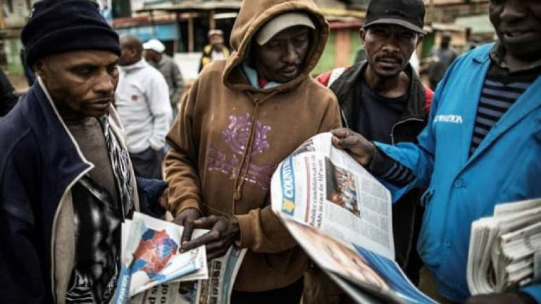 Tense Kenya awaits election results