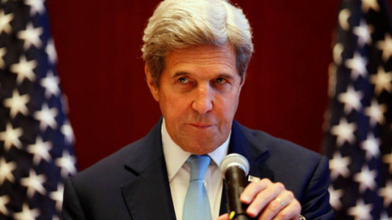 China-Philippines should 'turn page' on sea row: Kerry