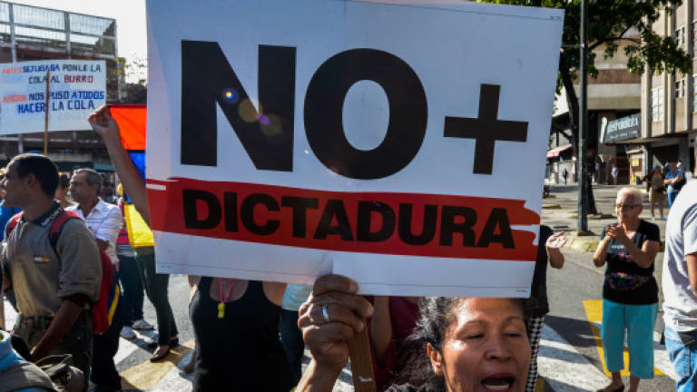 Protests brew as Venezuela leader denies coup