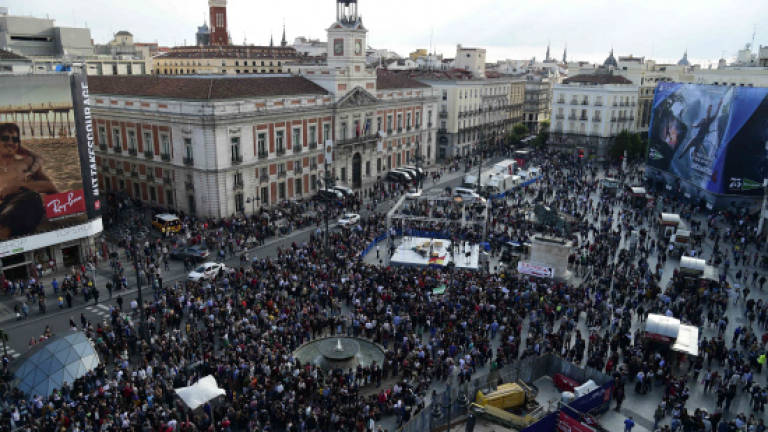 Spaniards march on anniversary of Indignados movement