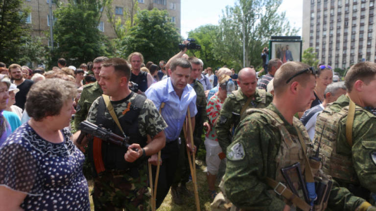 East Ukrainians in rare protest against Russian-backed rebels