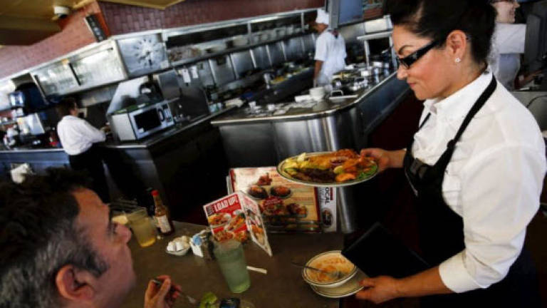 Washington votes to raised tipped workers' wages
