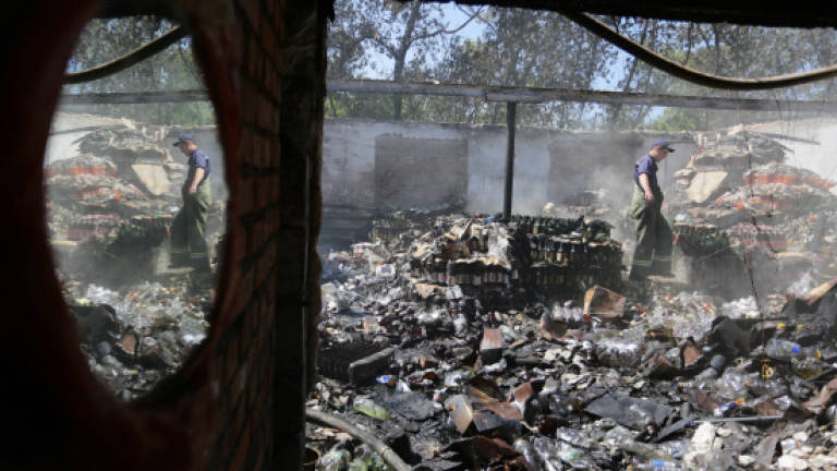 Four killed as new Ukraine peace talks fall apart