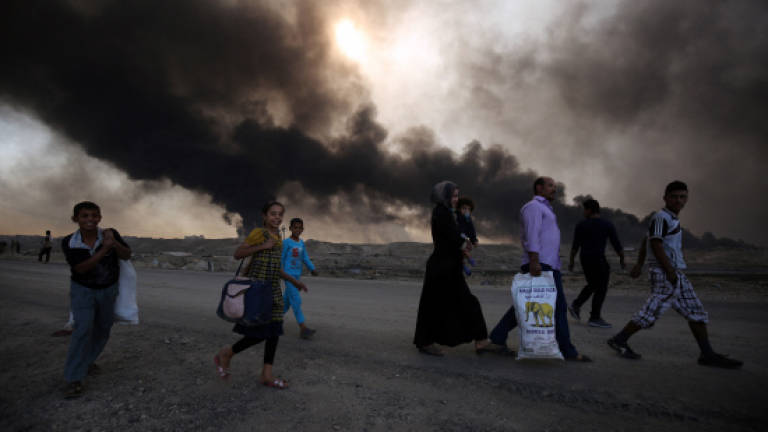 Iraq forces press Mosul assault, hunt Kirkuk attackers