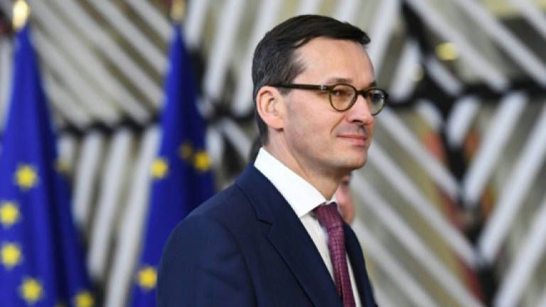 Polish PM expects EU to impose rare punishment over rule of law
