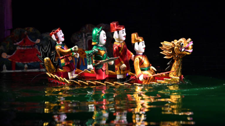 Tourism keeps Vietnam's ancient water puppets afloat