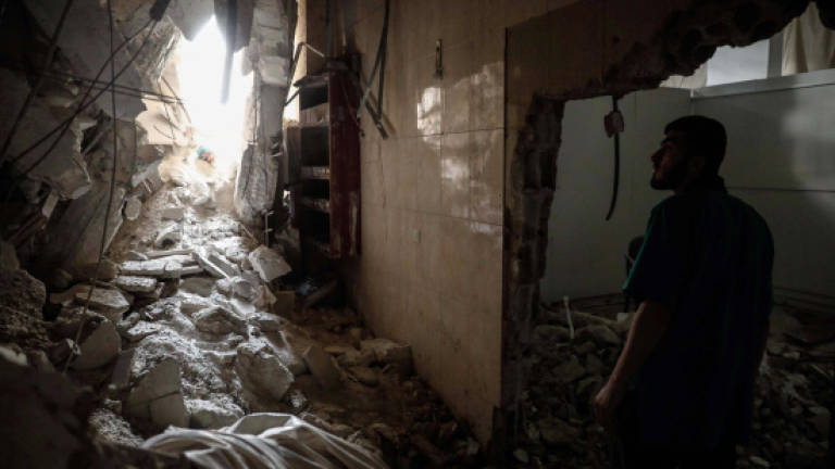 IS attack kills dozens at Syria camp