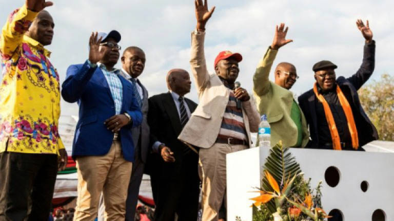 Zimbabwe's opposition unites to take on Mugabe