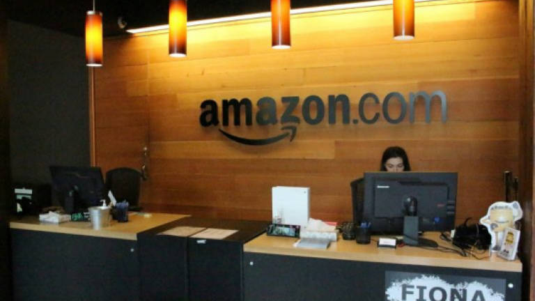 Amazon delivers hefty profits, led by web services