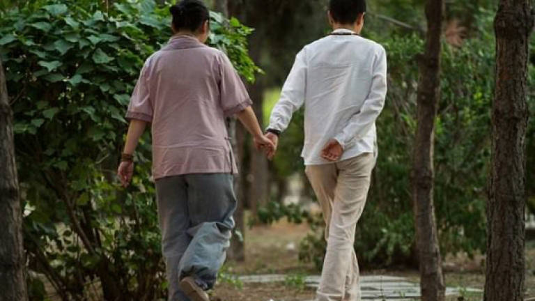 Secrets and wives: Gay Chinese hide behind 'sham marriage'