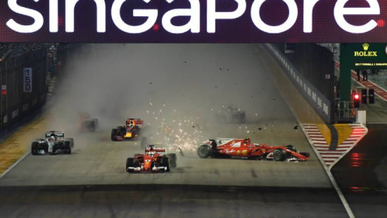 Hamilton wins crucial, chaotic Singapore GP