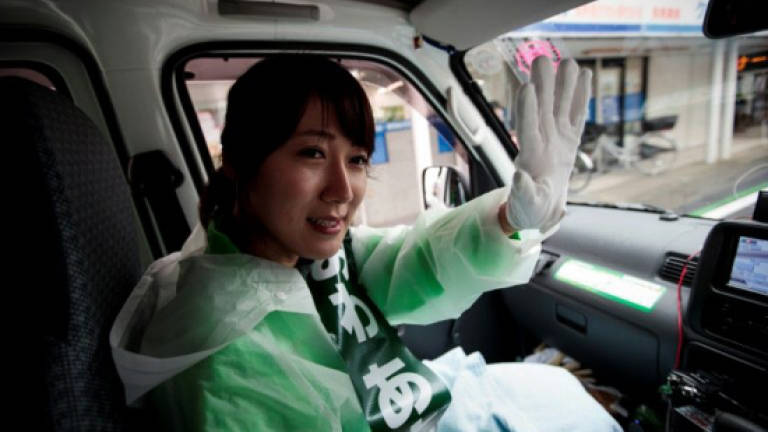 Learning to fly: Ex-flight attendant aims high in Japan vote