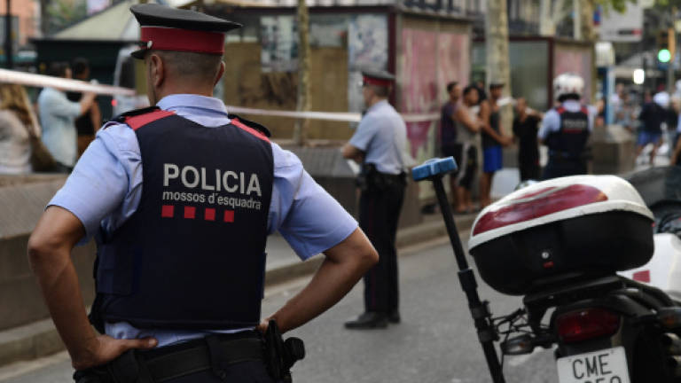 Spanish police in manhunt for driver who killed 13 in Barcelona rampage
