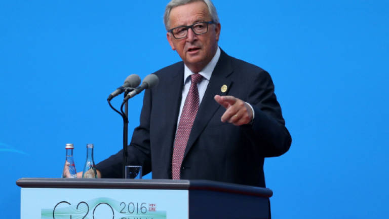 Juncker says he opposed Barroso joining Goldman Sachs