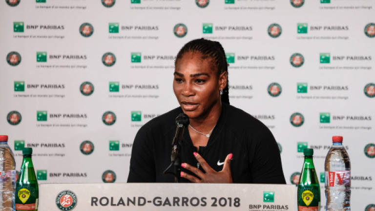 Roland Garros letdown as injured Serena hands Sharapova last-eight spot