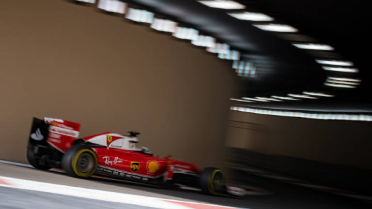 Vettel tops Hamilton in practice
