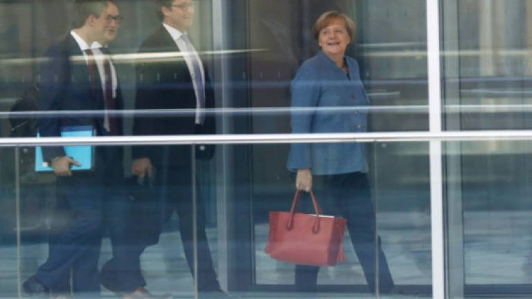 Merkel faces crucial deadline on coalition talks