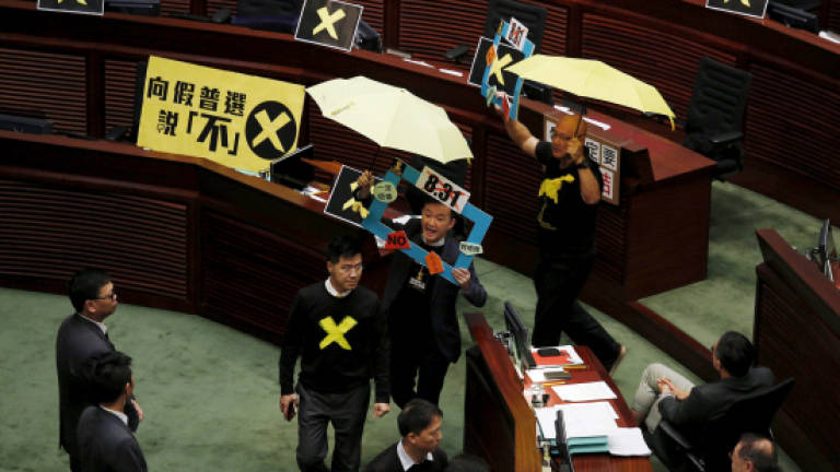 HK unveils vote plan