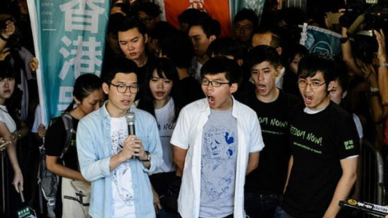 Jailed Hong Kong activist Wong found guilty of contempt of court