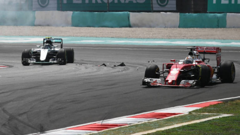 Vettel out on first lap of Malaysian GP