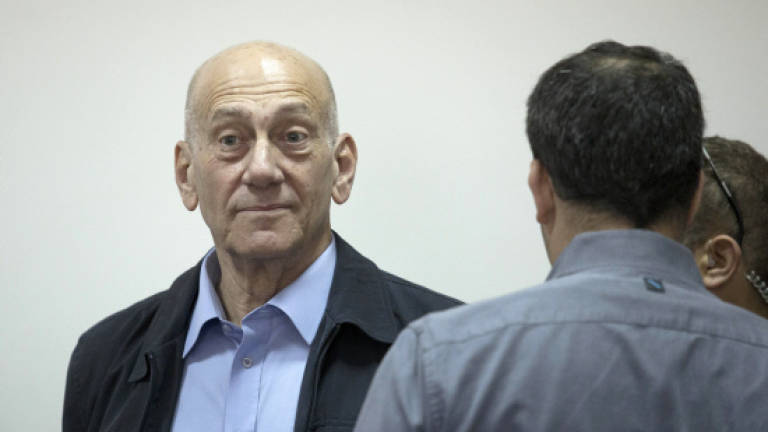 Ex-PM Olmert found guilty in corruption case