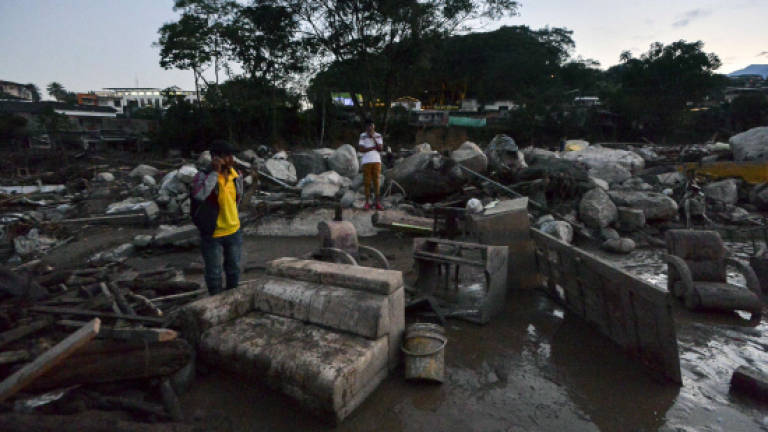 Colombia mudslides kill 206, sweep away homes