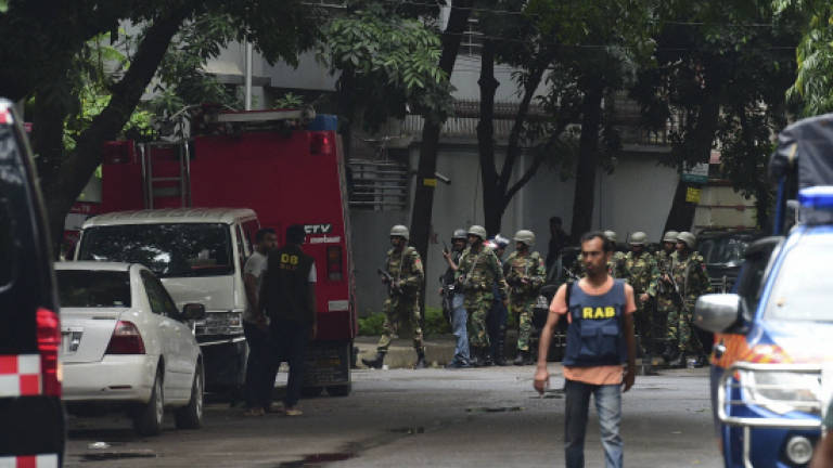 Bangladesh says head of group blamed for cafe siege dead
