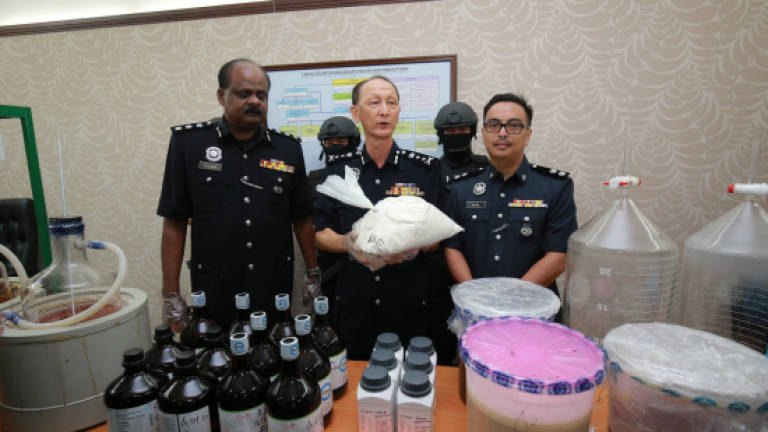 Police bust drug lab disguised as fish farm, seize RM5.2m worth of drugs