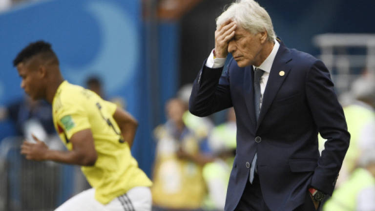 Red card derails Colombia plans while Japan make World Cup history