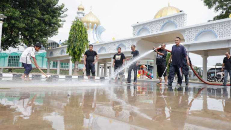Penang begins clean-up efforts after disastrous floods