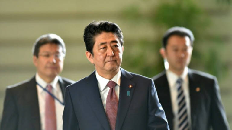 Japan's Abe to launch new cabinet after scandals