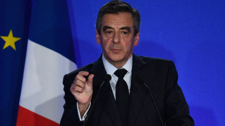 France's Fillon apologises for expenses scandal but refuses to step aside
