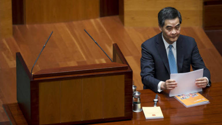 Hong Kong leader warns of 'anarchy'; opposition disrupts session
