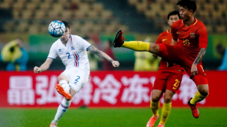 Expanded World Cup has China daring to dream