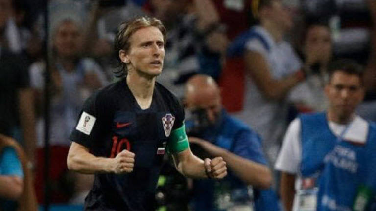 Modric pleased to get through 'another drama' at World Cup