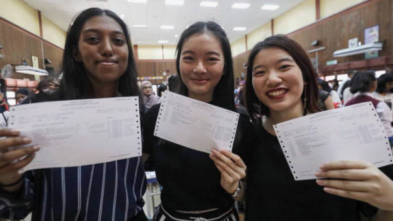 Three best friends complete brilliant double, scoring straight As in SPM and PT3