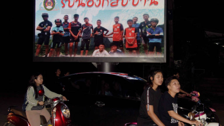 Global relief as all boys and coach rescued from Thai cave